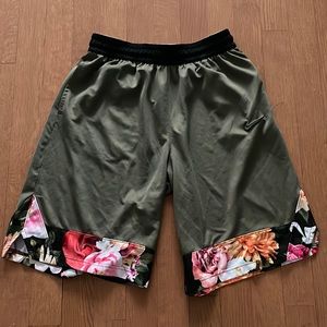 Nike green basketball shorts with floral detail